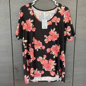 Piphany “Torrey” short sleeve floral top.